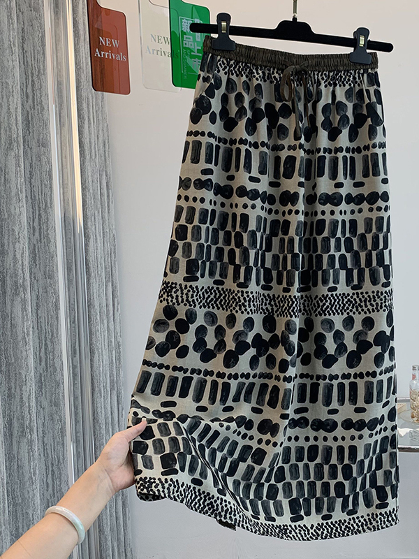 Falda midi holgada y ligera co - Midi Skirt Floral reseña y precio
